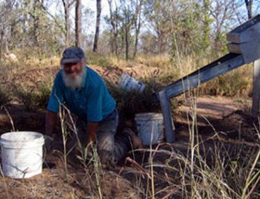 Grey nomads fossicking iin the NT
