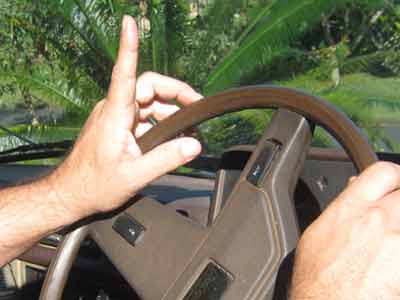 Grey nomads wave on roads