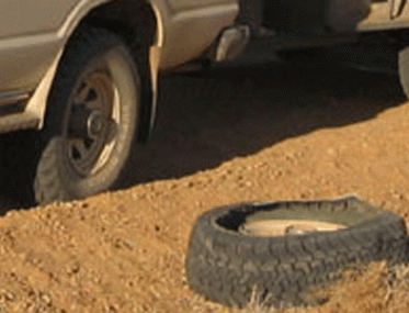 Grey nomads tyre blows out