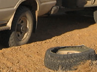 Grey nomads tyre blows out