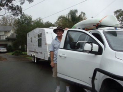 Grey nomads hit emu with caravan