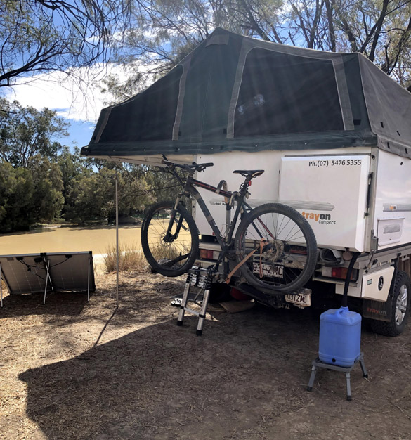 Solo grey nomad in slide-on camper 