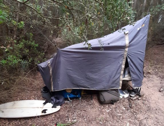 Homeless people living in tents